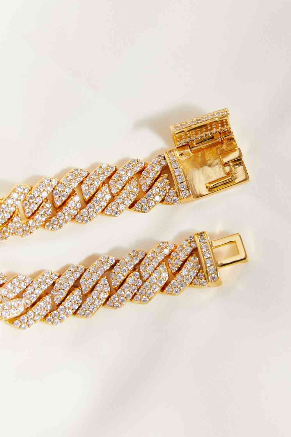 The clasp of gold-plated alloy bracelet with zircon inlay – Adjustable 7 and 8-inch chain.