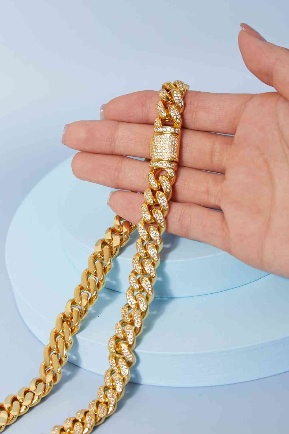 Brass curb chain necklace with cubic zirconia accent – 18-inch length, flat lay style.