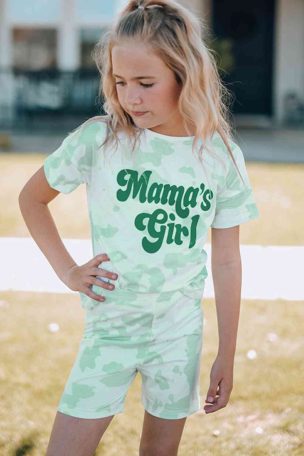 Girls Printed Letter Graphic Lounge Set with short sleeve tee and elastic waistband pants, made from 95% polyester and 5% spandex, available for ages 4-11 years.
