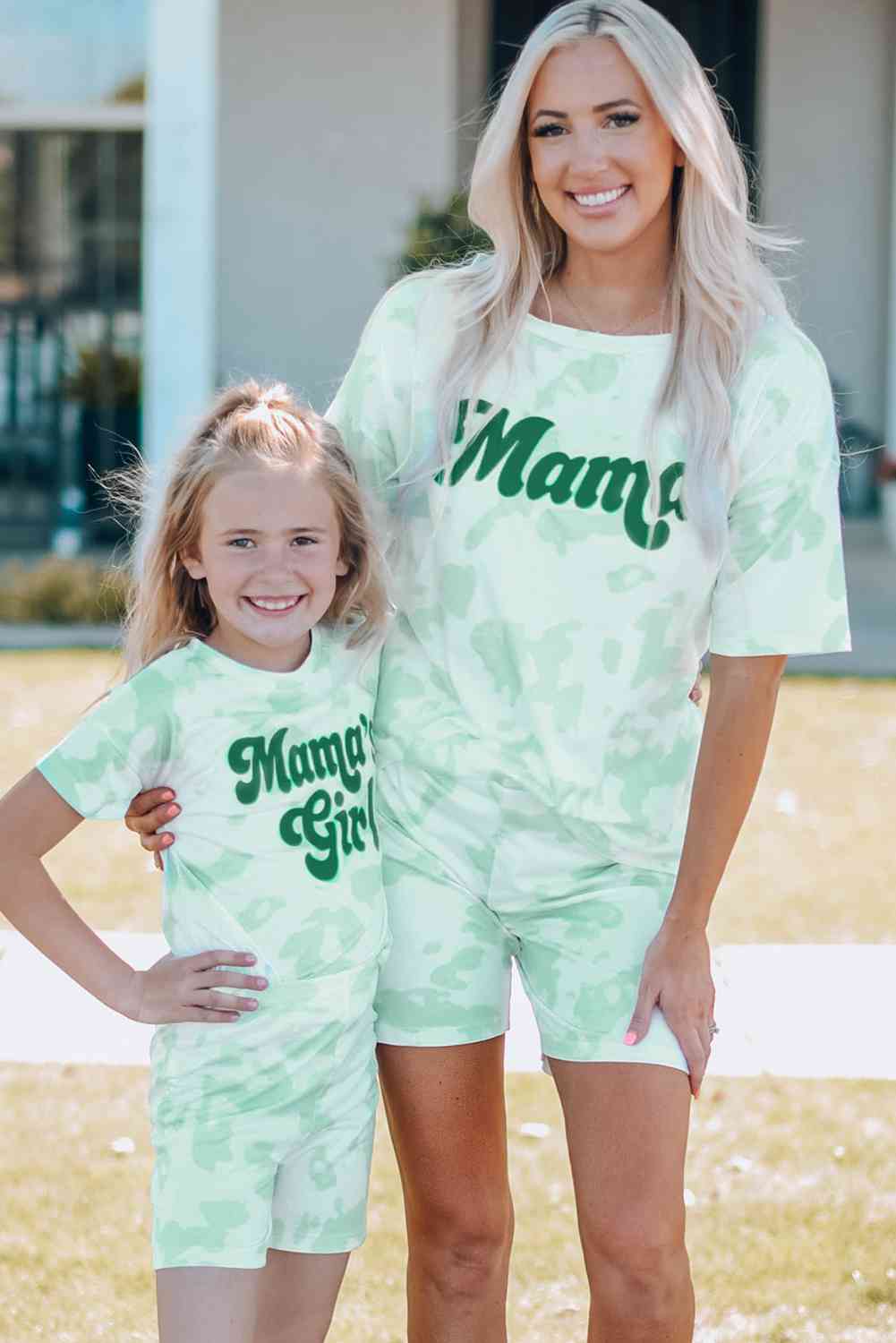 Girls Printed Letter Graphic Lounge Set with short sleeve tee and elastic waistband pants, made from 95% polyester and 5% spandex, available for ages 4-11 years.