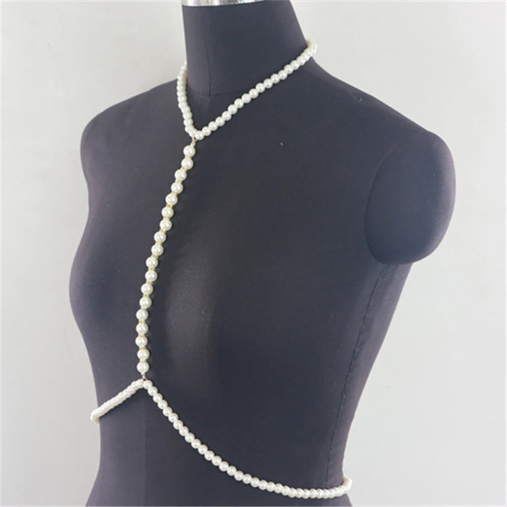 "Close-up of imitation pearl body chain with adjustable fit"
