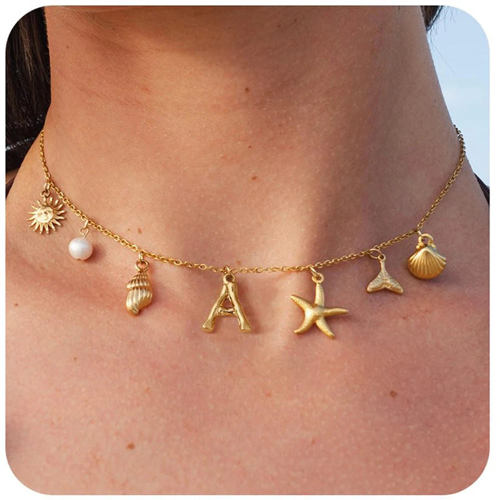 "Personalized Initial Surfer Girl Necklace with Starfish and Pearl Pendant"
"Bohemian Beach Necklace Gift for Women with Initial Pendant"
"Surfer Girl Initial Letter Necklace with Seashell and Starfish"
"Beach Jewelry for Women – Customizable Initial Necklace"
