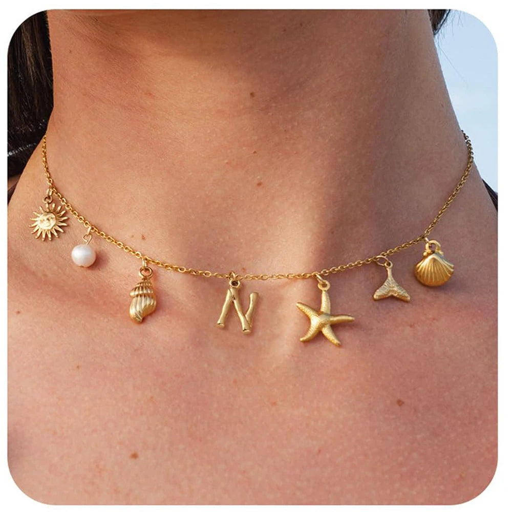"Personalized Initial Surfer Girl Necklace with Starfish and Pearl Pendant"
"Bohemian Beach Necklace Gift for Women with Initial Pendant"
"Surfer Girl Initial Letter Necklace with Seashell and Starfish"
"Beach Jewelry for Women – Customizable Initial Necklace"