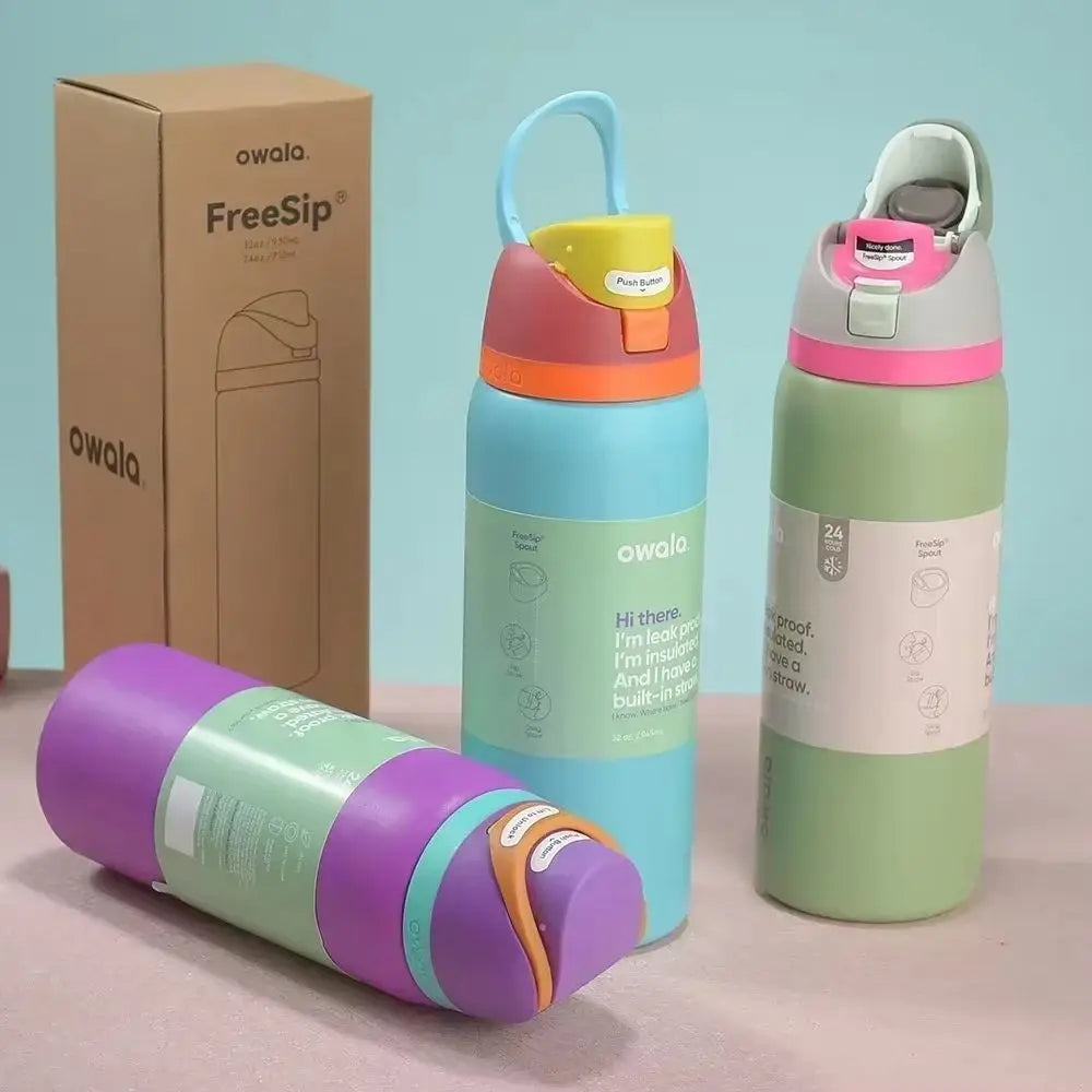 "Close-up of the Owala water bottle with straw and carrying handle"