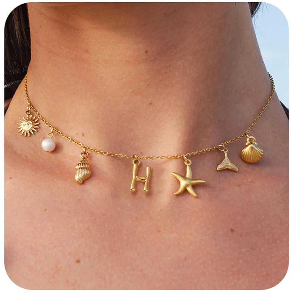 "Personalized Initial Surfer Girl Necklace with Starfish and Pearl Pendant"
"Bohemian Beach Necklace Gift for Women with Initial Pendant"
"Surfer Girl Initial Letter Necklace with Seashell and Starfish"
"Beach Jewelry for Women – Customizable Initial Necklace"