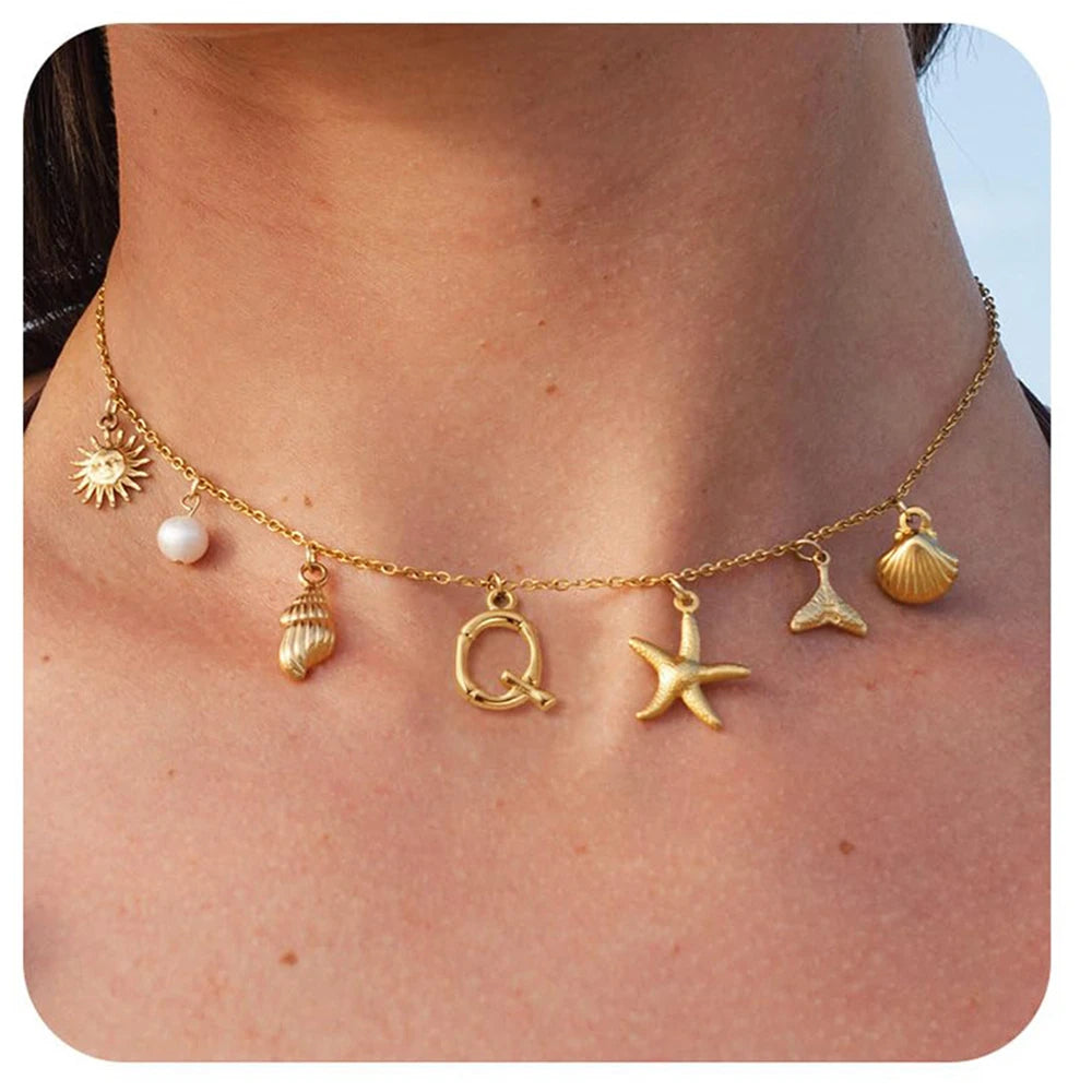 "Personalized Initial Surfer Girl Necklace with Starfish and Pearl Pendant"
"Bohemian Beach Necklace Gift for Women with Initial Pendant"
"Surfer Girl Initial Letter Necklace with Seashell and Starfish"
"Beach Jewelry for Women – Customizable Initial Necklace"
