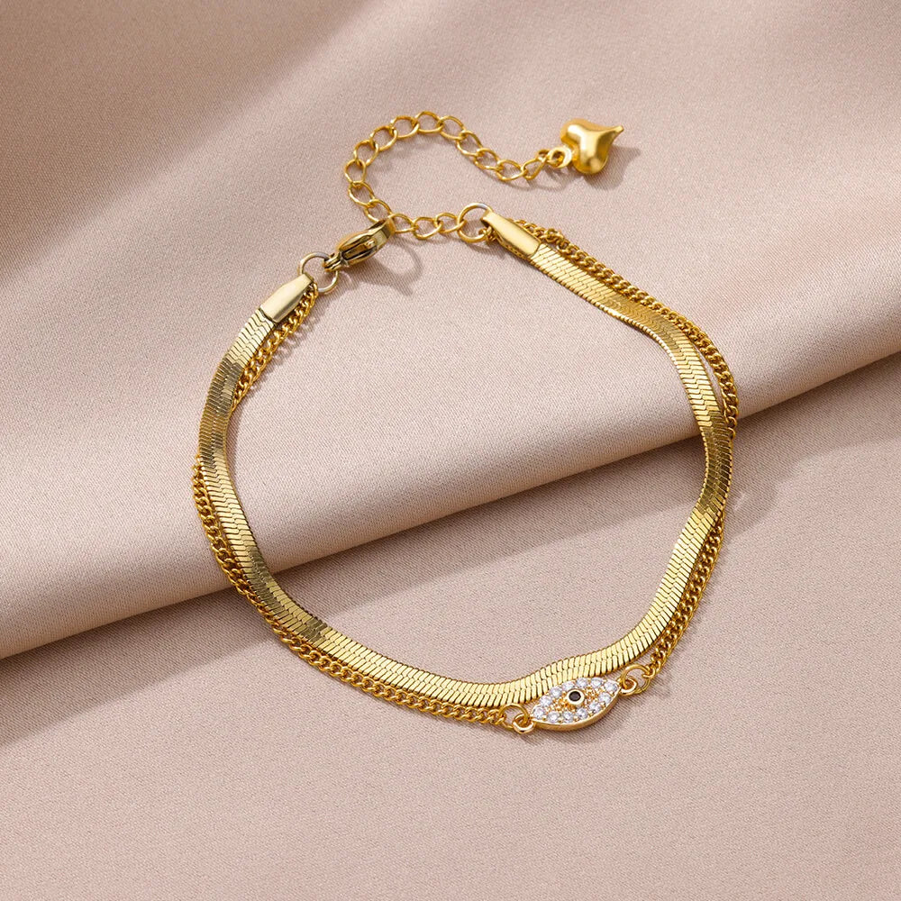 "Boho Evil Eye Anklet for Women with Cubic Zirconia"
"Stainless Steel Evil Eye Anklet for Lucky Summer Style"
"Trendy Beach Jewelry Anklet with Snake Chain and Evil Eye Design"