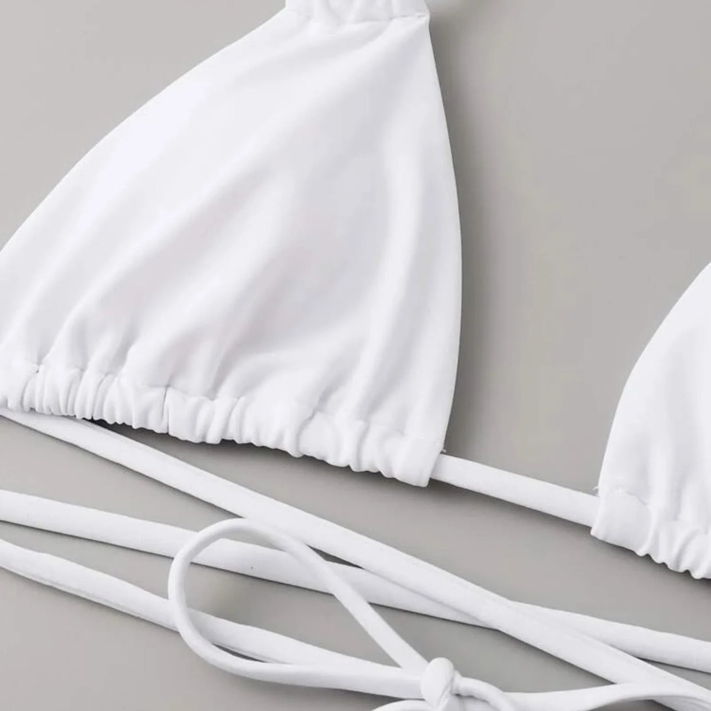 "Solid Color Women’s Bikini Set"
"Sexy Three-Piece Beach Bikini"
"Adjustable Strap Swimwear for Women"