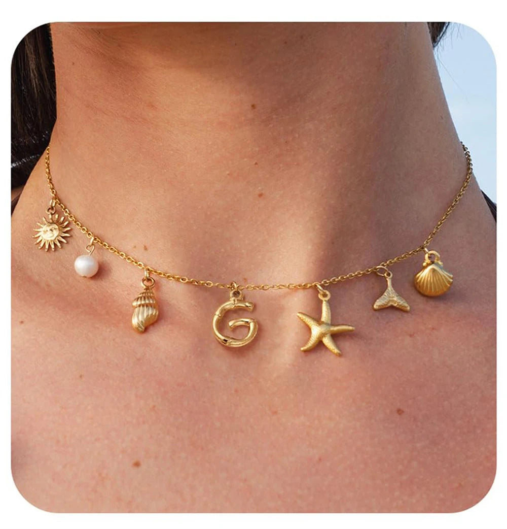 "Personalized Initial Surfer Girl Necklace with Starfish and Pearl Pendant"
"Bohemian Beach Necklace Gift for Women with Initial Pendant"
"Surfer Girl Initial Letter Necklace with Seashell and Starfish"
"Beach Jewelry for Women – Customizable Initial Necklace"
