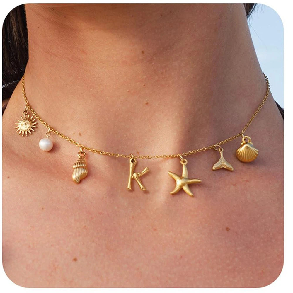"Personalized Initial Surfer Girl Necklace with Starfish and Pearl Pendant"
"Bohemian Beach Necklace Gift for Women with Initial Pendant"
"Surfer Girl Initial Letter Necklace with Seashell and Starfish"
"Beach Jewelry for Women – Customizable Initial Necklace"
