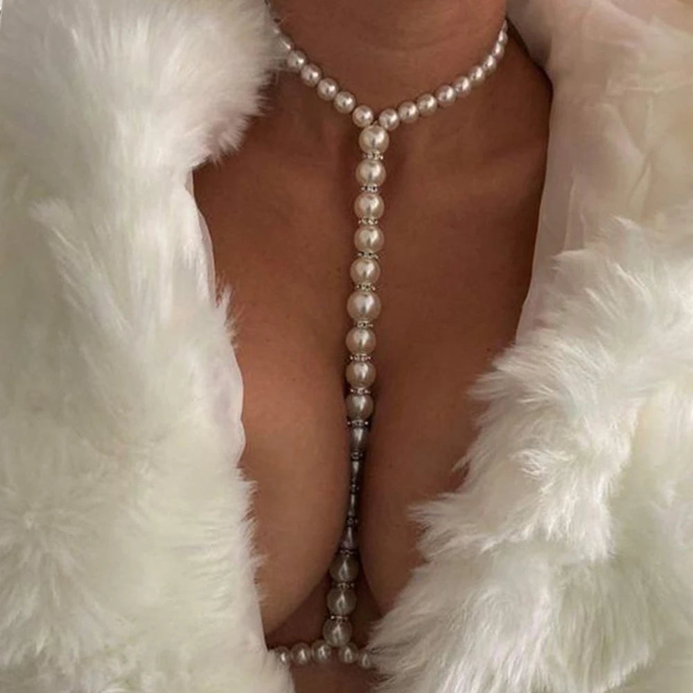 "Close-up of imitation pearl body chain with adjustable fit"