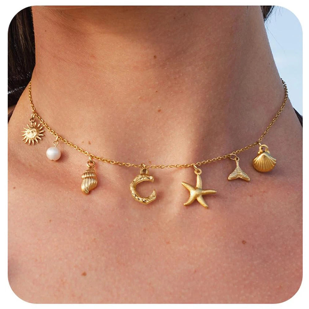 "Personalized Initial Surfer Girl Necklace with Starfish and Pearl Pendant"
"Bohemian Beach Necklace Gift for Women with Initial Pendant"
"Surfer Girl Initial Letter Necklace with Seashell and Starfish"
"Beach Jewelry for Women – Customizable Initial Necklace"
