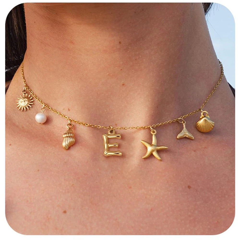 "Personalized Initial Surfer Girl Necklace with Starfish and Pearl Pendant"
"Bohemian Beach Necklace Gift for Women with Initial Pendant"
"Surfer Girl Initial Letter Necklace with Seashell and Starfish"
"Beach Jewelry for Women – Customizable Initial Necklace"
