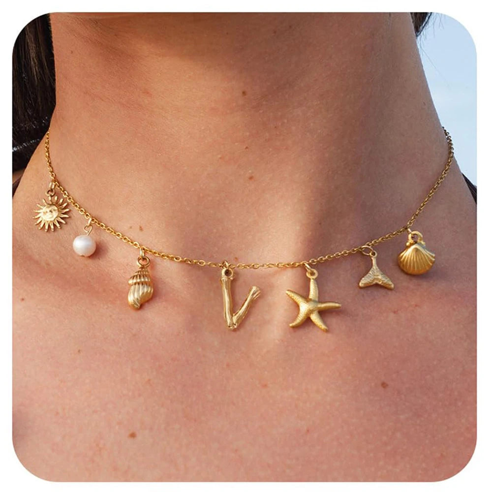 "Personalized Initial Surfer Girl Necklace with Starfish and Pearl Pendant"
"Bohemian Beach Necklace Gift for Women with Initial Pendant"
"Surfer Girl Initial Letter Necklace with Seashell and Starfish"
"Beach Jewelry for Women – Customizable Initial Necklace"
