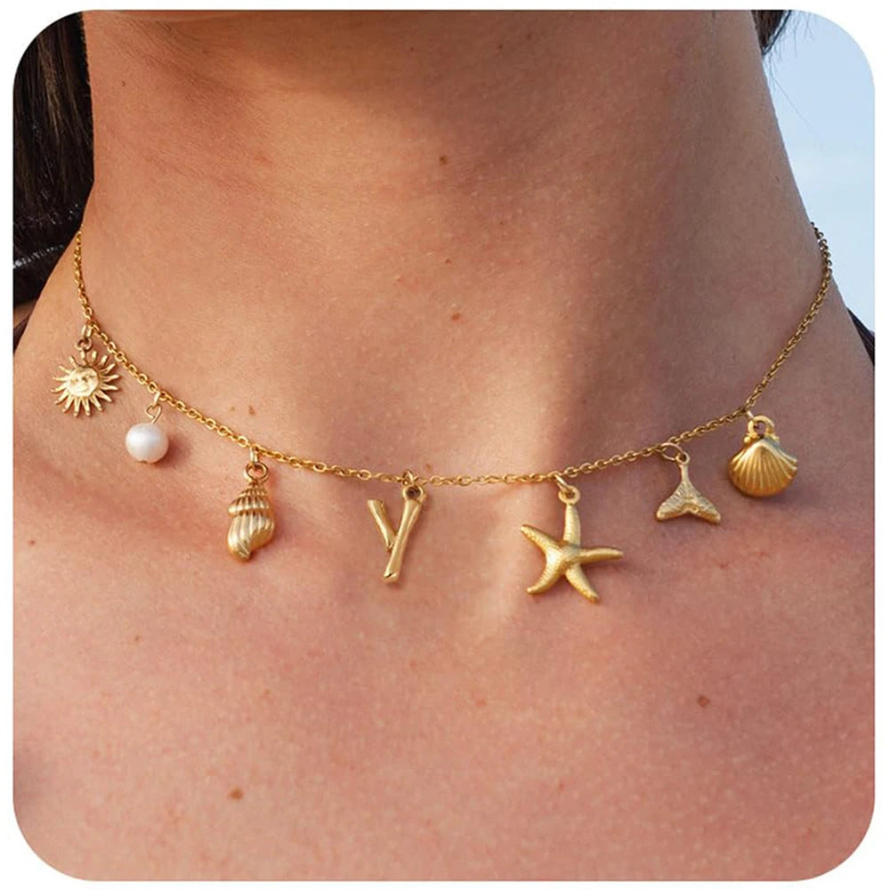 "Personalized Initial Surfer Girl Necklace with Starfish and Pearl Pendant"
"Bohemian Beach Necklace Gift for Women with Initial Pendant"
"Surfer Girl Initial Letter Necklace with Seashell and Starfish"
"Beach Jewelry for Women – Customizable Initial Necklace"