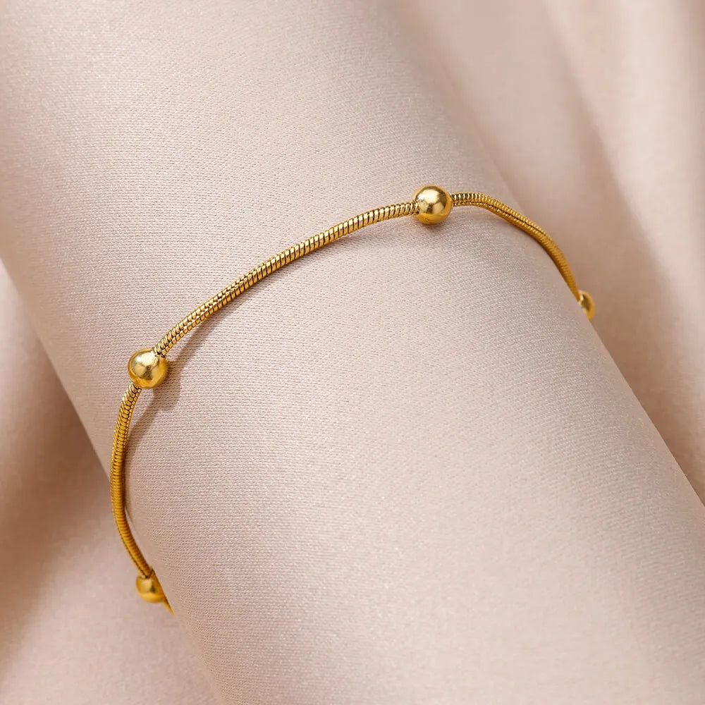"Gold Vintage Stainless Steel Anklet for Women"
"Adjustable Stainless Steel Anklet Bracelet - Foot Jewelry for Women"
"Classic Beach Anklet Jewelry for Women"
"Vintage Adjustable Gold Anklet for Wedding or Party"