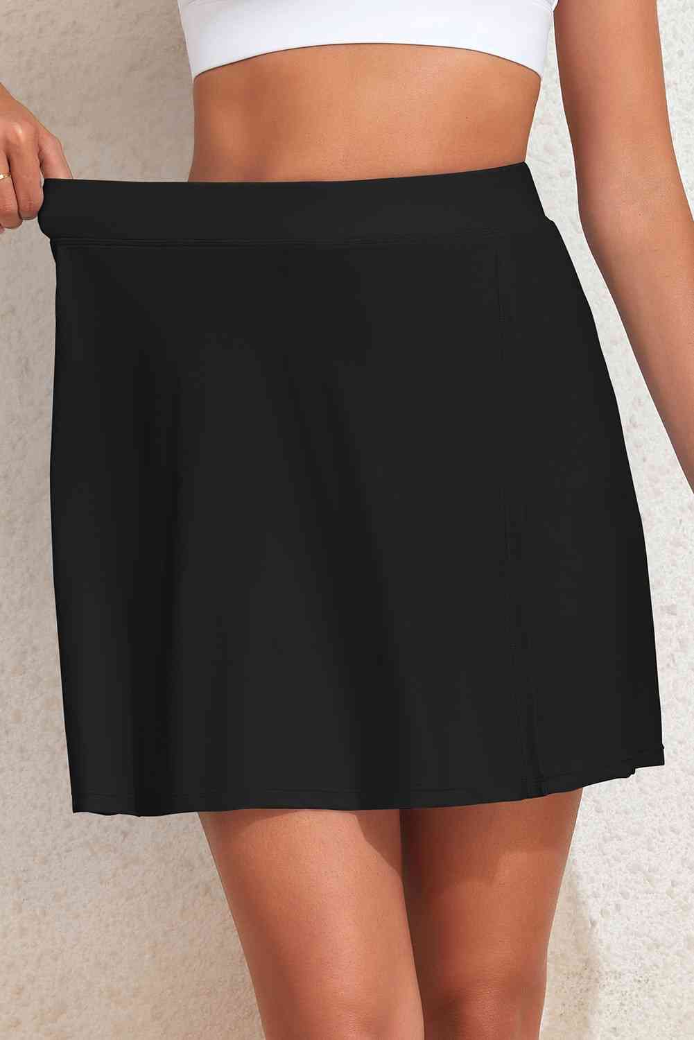 Slit Swim Skort with Pockets in solid color, made from stretchy nylon-spandex fabric, perfect for beach and pool days.